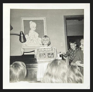Child Holding Lite-Brite Toy B/W Snapshot Photograph Vintage - Picture 1 of 2