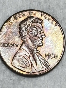 1998 A Strike Though With A Circular Object That Distorts Lincoln’s Head . - Picture 1 of 7