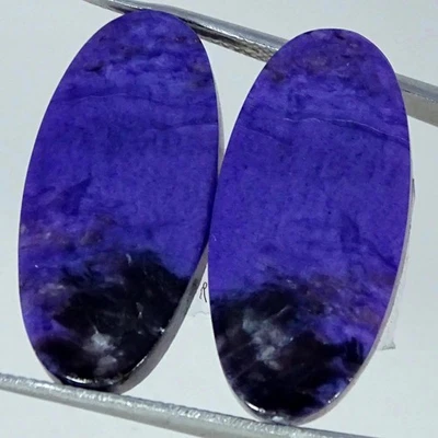 28.40Cts. Natural Purple Charoite Pair Oval Cabochon Gemstone 13X27X4MM - Image 1 of 4