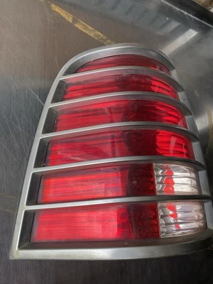 2002 2003 2004 2005 Mercury Mountaineer Left Driver Side Rear Tail Light  - Image 1 of 4