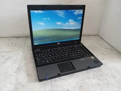 HP Compaq 6515b 14.1" Laptop AMD Turion X2 2GB RAM 320GB HDD Windows XP -RR - Image 1 of 4