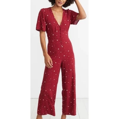 Mono con estampado de estrellas Lindy rojo capa marina XS pierna ancha botón delantero mono Foto 1 de 4