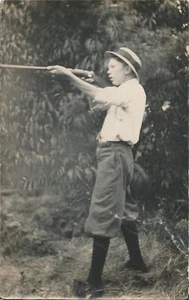 Antique RPPC Photo Postcard Young Man Teen Boy Hunting Rifle Gun Outdoors Hat - Picture 1 of 10
