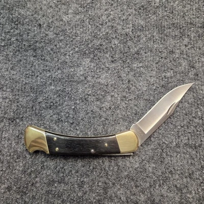 Navaja de Bolsillo Buck 110 Hoja Lisa Bloqueo Plegable Cazador Madera de Ébano  Foto 1 de 4