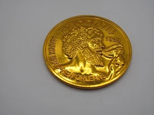 2025 KREWE OF BACCHUS "LOUISIANA FAIRS AND FESTIVALS" METALLIC GOLD DOUBLOON - Picture 1 of 2