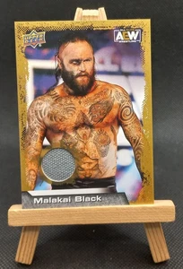 Parche negro Malakai 2022 Upper Deck AEW/WWE - Gold Mat Relics #51 - Imagen 1 de 2