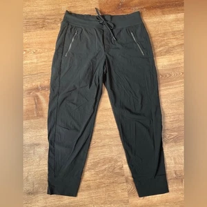 Pantalone jogger Athleta Trekkie North taglia 8P PETITE nero asciugatura rapida tasche zip - Foto 1 di 10