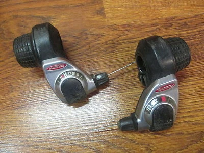 SHIMANIO SL-RS40 7SPEED TRIPLE 3X7 GRIP TWIST SHIFTER  22.2 CLAMP SET - Image 1 of 4