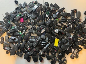 LARGE LOT OF KEY FOBS OEM AND AFTERMARKET LOT UNTESTED LARGE BOX FILLED 21 - Picture 1 of 4