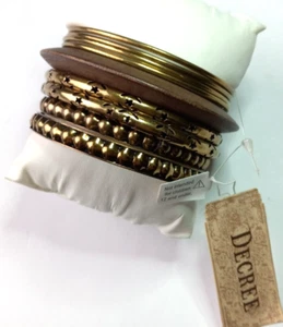 Decree Stackable Gold Toned and Wooden Bangel Bracelets Set of 9 - Picture 1 of 9