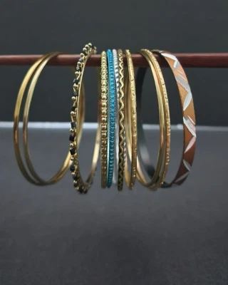 Paquete de Pulseras de Aluminio y Plata 2.5 pulgadas Diseños Surtidos 11 Unidades Foto 1 de 4