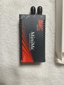 IMC MiniMc Fiber / Ethernet Switching Media Converter (10/100/ mbs) - Picture 1 of 9