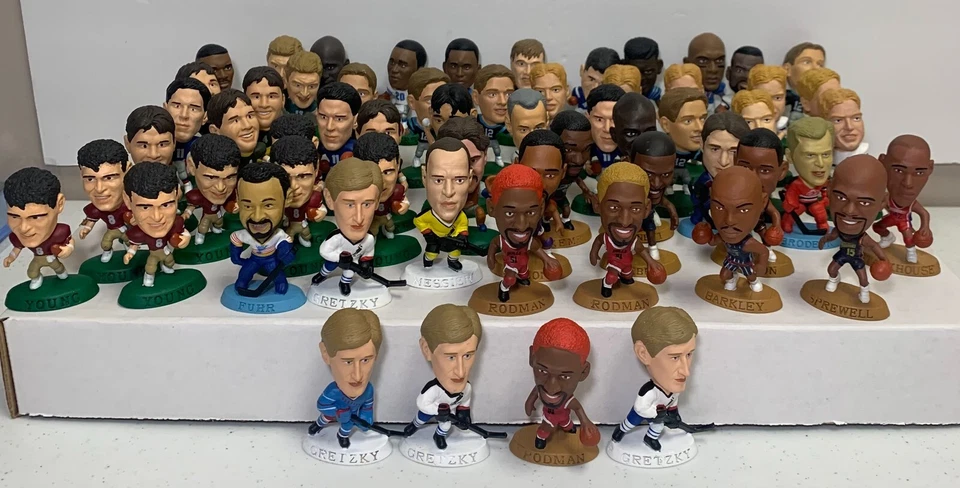 Lote de 69 figuras Headliner - Sanders, Aikman, Ripken, Malone, Gretzky con 4 certificado de autenticidad Foto 1 de 4