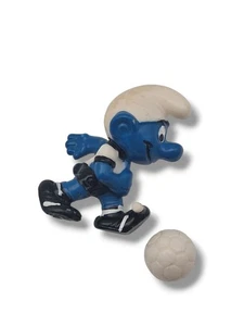 ⚡Campón centro delantero + pelota original fútbol pitufos figura Üei⚡ - Imagen 1 de 9