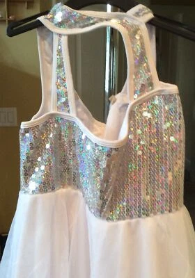 Vestido brillante blanco y plateado con falda de red blanca para niñas Foto 1 de 4