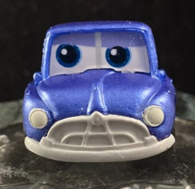 Disney Doorables - Doc Hudson - Coches - Serie 9 - Común Foto 1 de 4