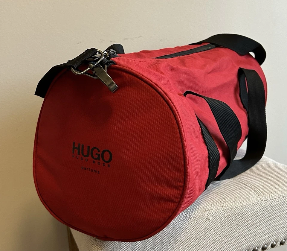 Bolso de mano Hugo Boss Parfums Weekender rojo y negro para pasar la noche Foto 1 de 4