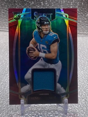 TREVOR LAWRENCE 2021 Select Rookie Swatches Red Prizm Jersey RC #RSW-TLR Jaguars - Image 1 of 4