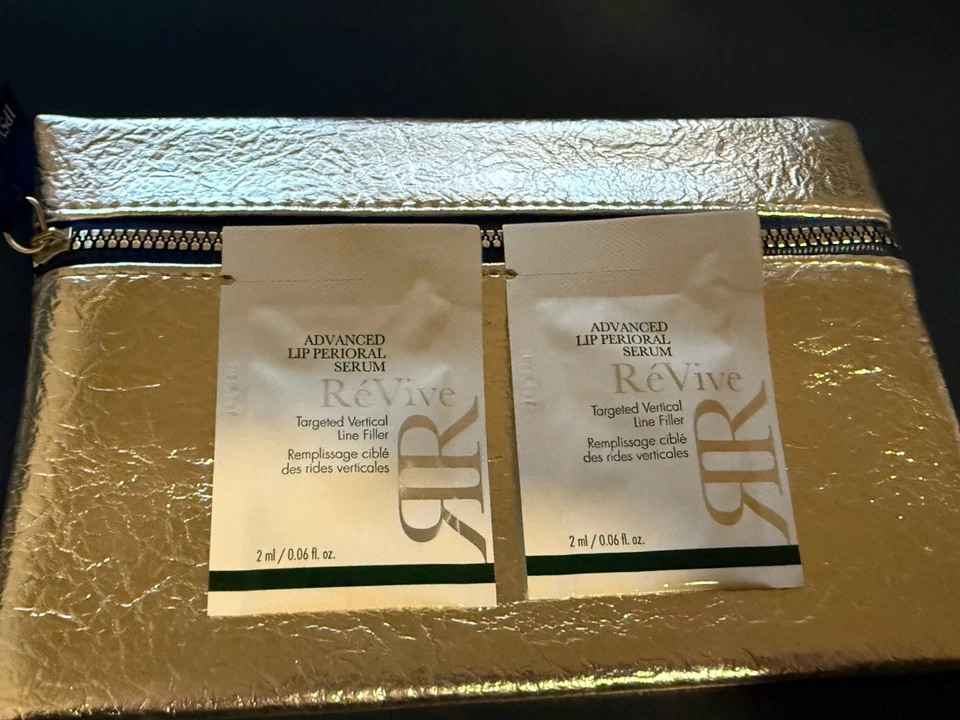 LOT OF 2- RE’VIVE INTENSITÉ VOLUMIZING LIP SERUM SAMPLES + Make Up BAG! - Image 1 of 3