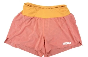 Pantaloncini da corsa Hoka Glide 4" arancione donna media tasca zip fodera integrata logo - Foto 1 di 10