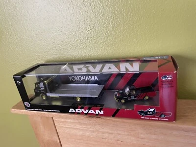 M2 Machines Yokohama/Advan Chase Hauler 1978 Datsun 620 & 1957 Mack Model N 750 - Image 1 of 2