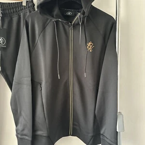 Tuta uomo Gym King pista nera bordo oro nuova stagione £60 - Foto 1 di 15