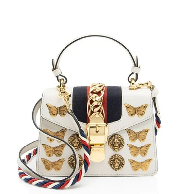 Mini bolso Gucci de cuero con tachuelas de animales Sylvie Foto 1 de 4