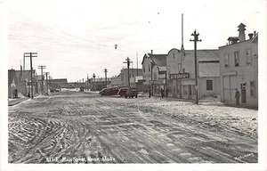 Nome AK Dirt Main Street Store Fronts "North Pole Bakery"  RPPC Postcard - Picture 1 of 2