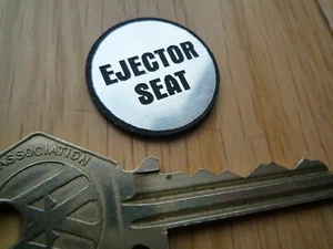 Ejector Seat Self Adhesive Car Plane Badge 25mm Button Humorous Funny Joke - Picture 1 of 1