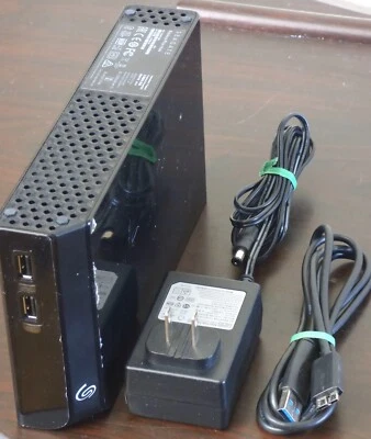 Concentrador Seagate Backup Plus, 1XAAP2-500, 6 TB, con adaptador de CA y cable USB Foto 1 de 4