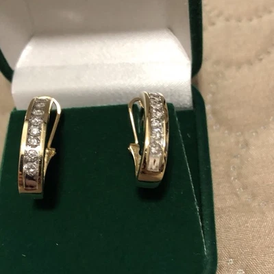 # 243, 14k YELLOW GOLD AND EARTH DIAMOND CHANNEL SET J HOOPS. - Image 1 of 4