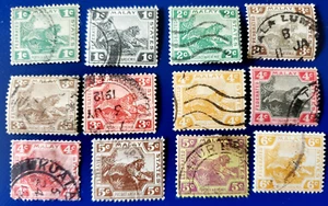 Lote de 12 estampillas antiguas de Malasia, Malasia y Malasia #96q Tigre - Imagen 1 de 1