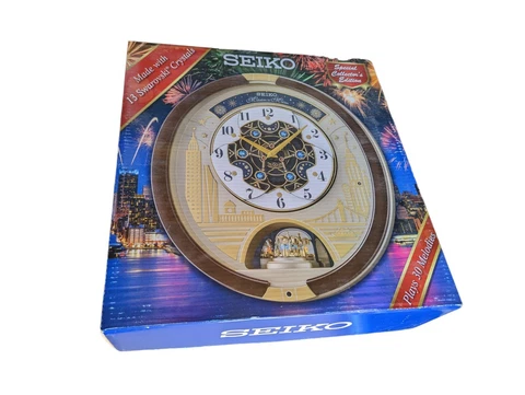 Seiko Melody in Motion Wall clock- "Starry Night Over City Scape" QXM382BRH Cover