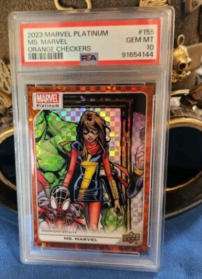 2023 upper deck Marvel Platinum/Orange Checkers/#155/Ms. Marvel/ PSA 10 - Image 1 of 3
