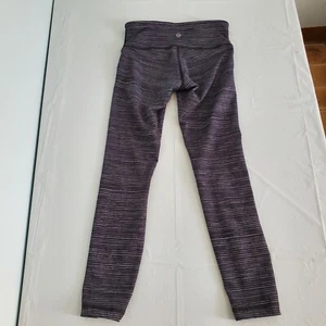 Leggings Lululemon Athletica para mujer talla 4 rayas negras sin talla etiqueta entrepierna 24" - Imagen 1 de 10