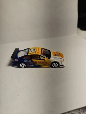 Coche diecast Opel Calibra V6 1:64 sin marca #22 Newspace Turbo #22 Foto 1 de 4
