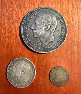 SPAIN 1870-1885 5 PESETAS, 1 PESETA, & 1 CENTIMO COINS, VF to XF, LOT OF (3) - Image 1 of 2