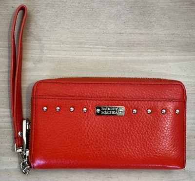 BADGLEY MISCHKA Cuero Vegano Naranja Tachonado Muñequera/Cartera/Correa de Mano 6.5x4 Foto 1 de 4