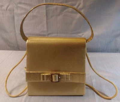 Cartera sin asas Daniel Ames cinta dorada Navidad Año Nuevo Barbiecore vacaciones Foto 1 de 4