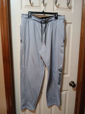 Pantalones de chándal Reebok para hombre XL gris con cremallera bolsillos/tobillos uso activo Foto 1 de 4