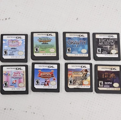 Nintendo DS Game Lot of 8 Lego Indiana Jones Shrek Dora Igor Rudolph Squinkies - Image 1 of 2