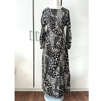 Vestido midi floral acanalado River Island talla 10 Foto 1 de 4