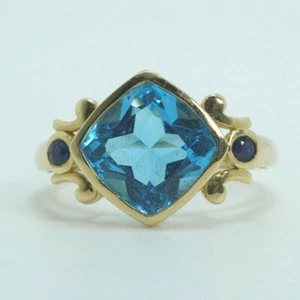 Anillo de topacio azul oro amarillo 14K STS Chuck Clemency talla 8 - Imagen 1 de 7
