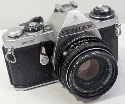 Piezas o reparación: cámara de película Pentax ME 35mm con lente SMC Penax-M 50mm f1.7 como nueva Foto 1 de 4