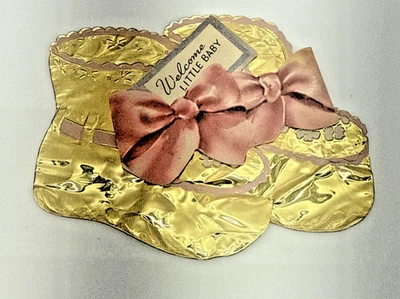Vintage 1954 Welcome Little Baby Gold Foil Metal Bootie Decoration 4.5x3 - Image 1 of 4