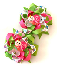 Beautiful Colorful Snail inspired set of pigtail hair bows for girls.