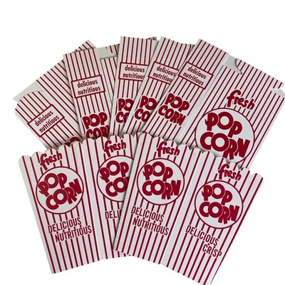 Bolsas de palomitas de maíz frescas con rayas rojas clásicas bocadillos nocturnos de cine u desechables Foto 1 de 4