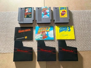 Super Mario Bros. SMB 1 + 2 + 3 (NES) - NUR CARTS + HANDBÜCHER *AUTHENTISCH*GETESTET - Bild 1 von 8