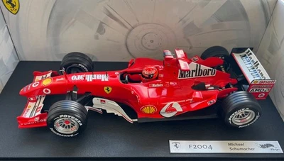 MICHAEL SCHUMACHER FERRARI F2004 7 x WORLD CHAMPION 1/18 2004 F1 CHAMPION - Image 1 of 4