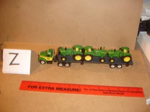 1/64 Ertl John Deere Mac Cab Semi with Hauling trailer and 3 5020 Tractors - Picture 1 of 3
